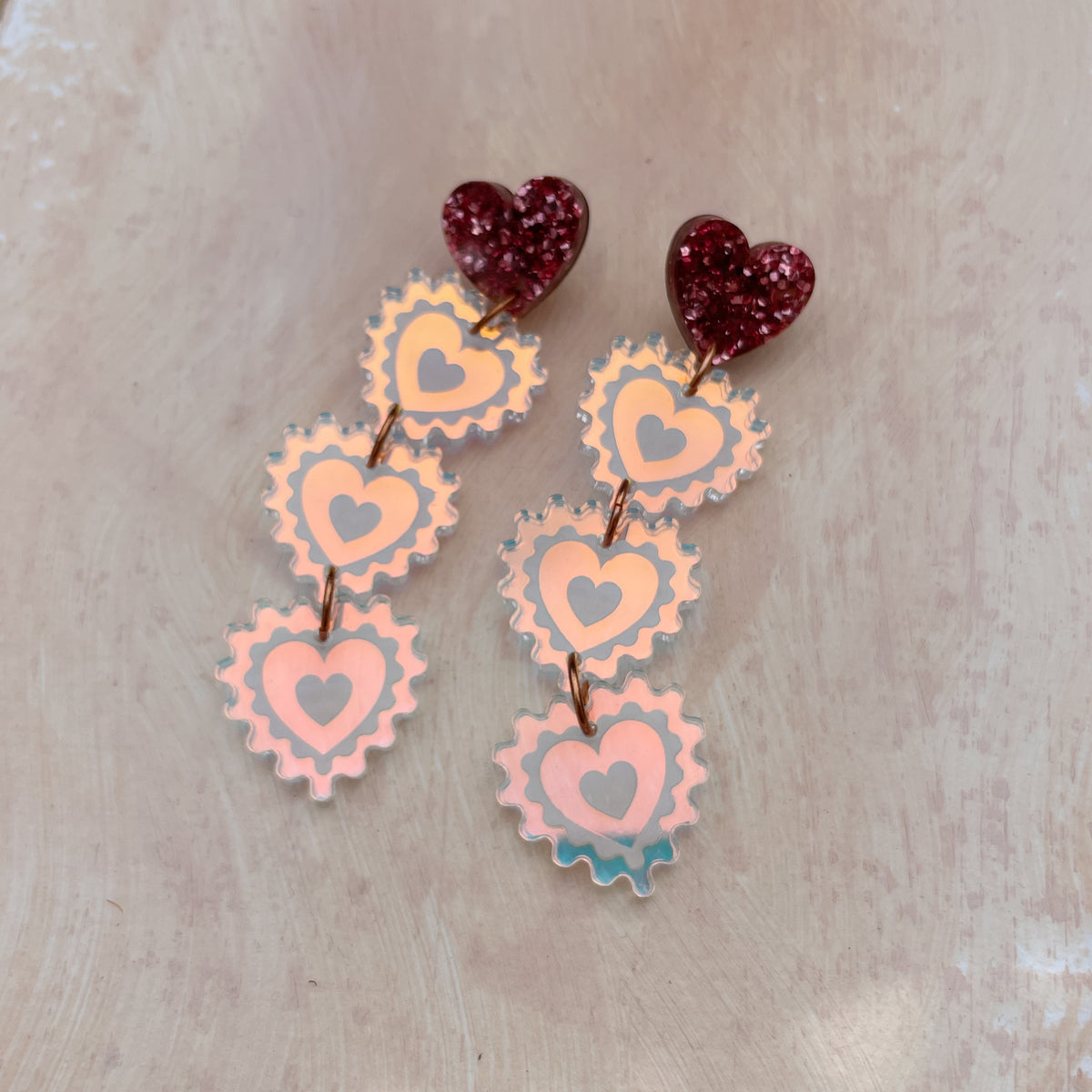 Triple Heart Drop Earrings in Rose Glitter and Warm Iridescent