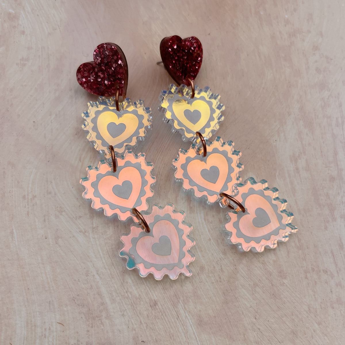 Triple Heart Drop Earrings in Rose Glitter and Warm Iridescent